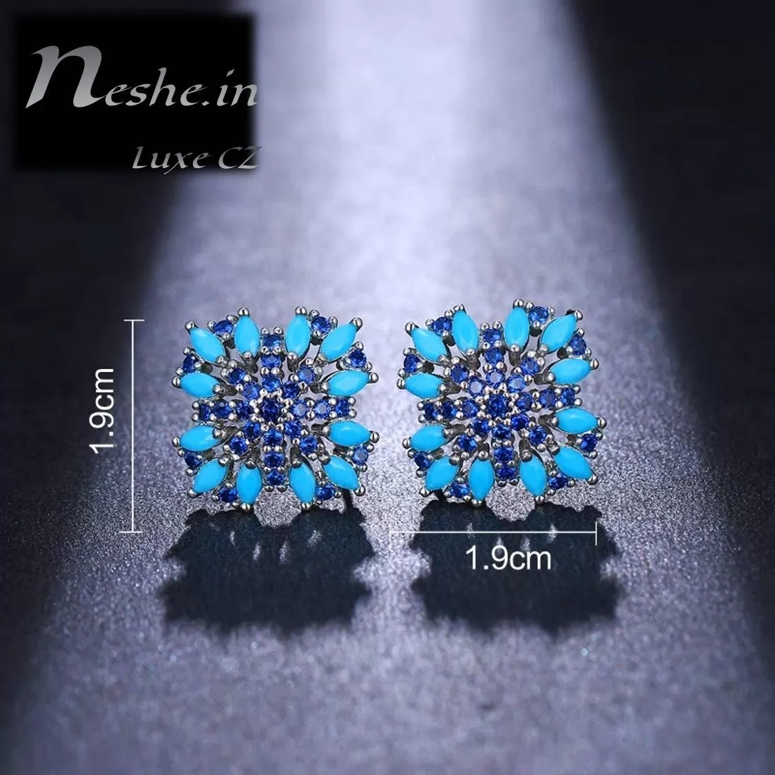 CZ Blue floral emitting shape stud earring