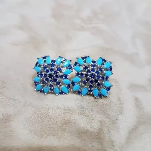 CZ Blue floral emitting shape stud earring