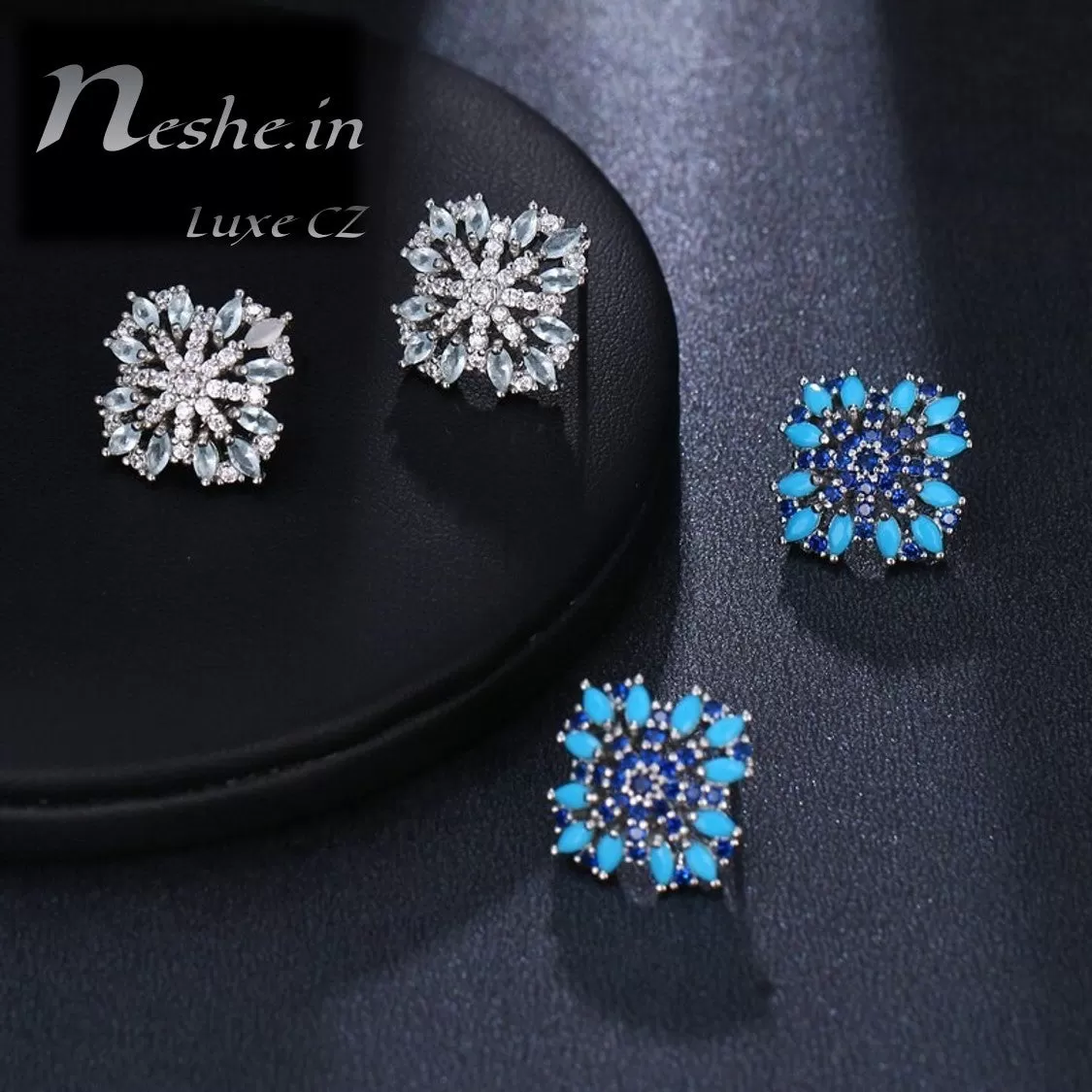 CZ Blue floral emitting shape stud earring