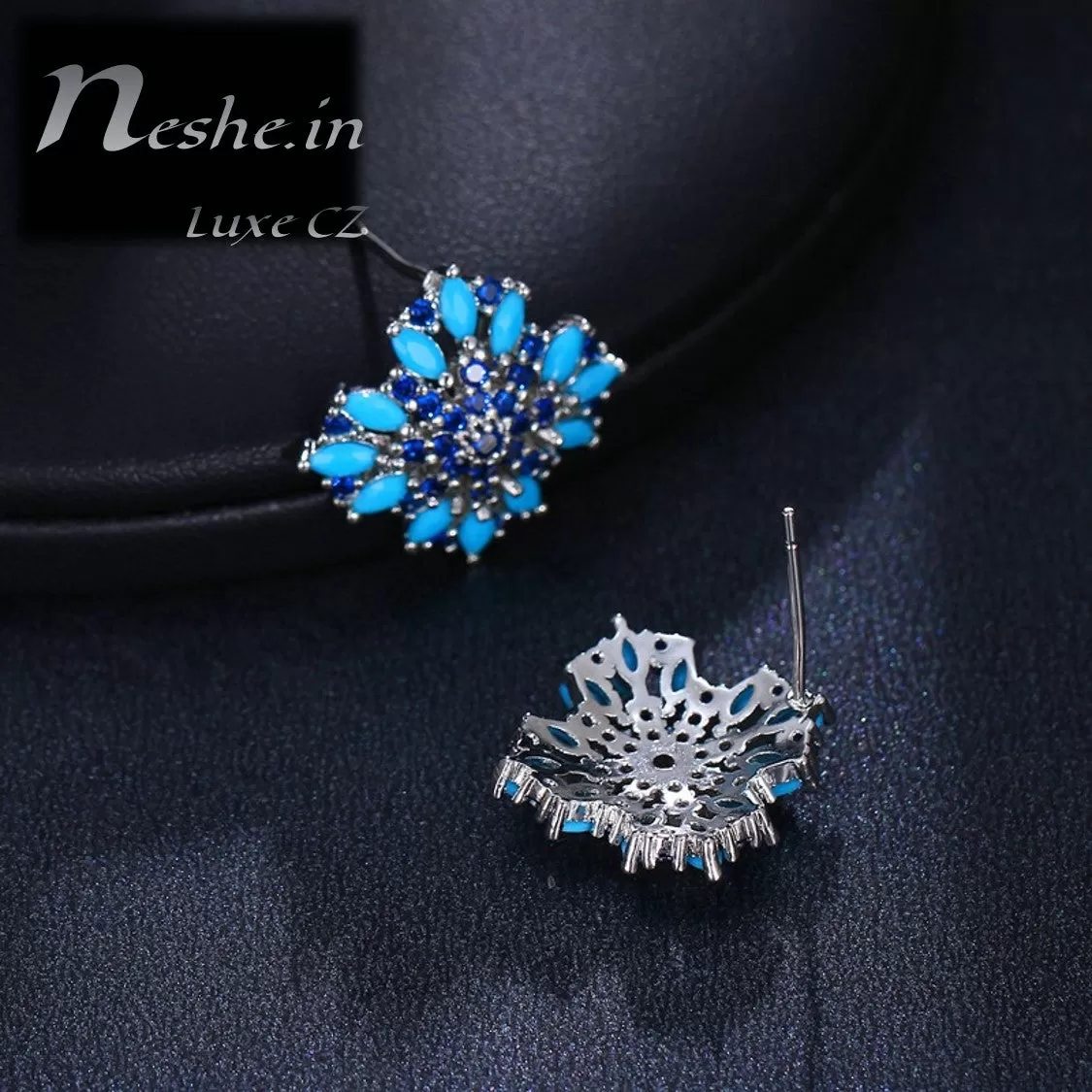 CZ Blue floral emitting shape stud earring