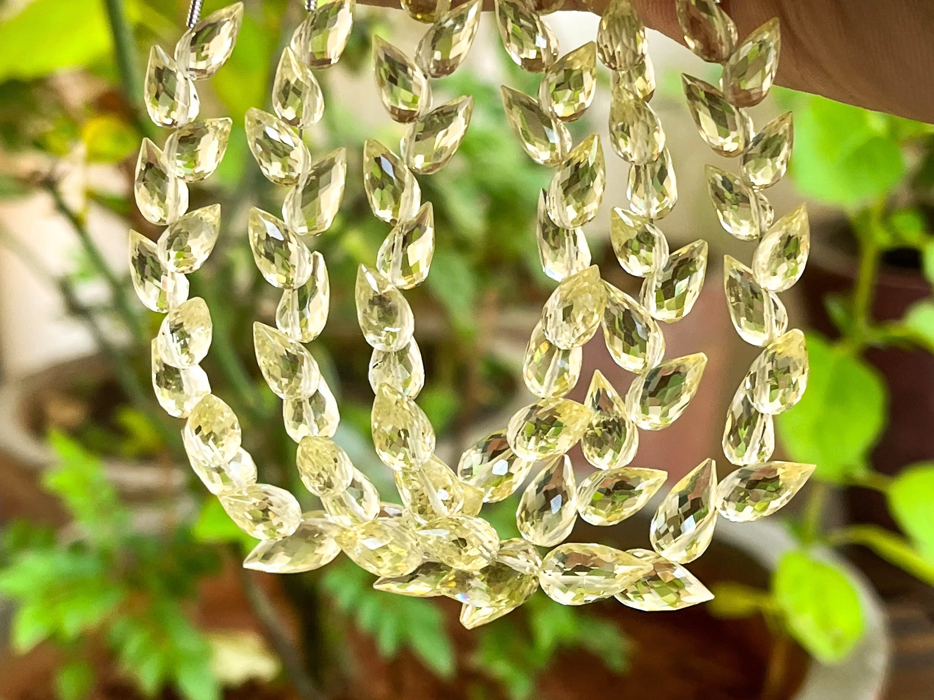 Yellow Orthoclase flower bud faceted drops